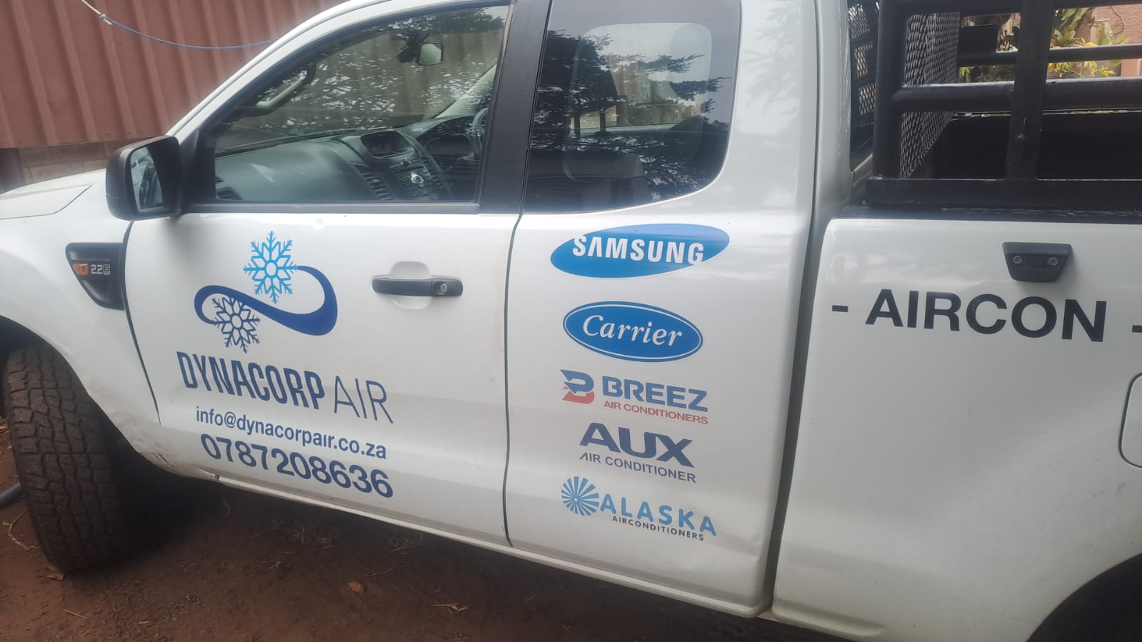 DynaCorp Air team and vehicles